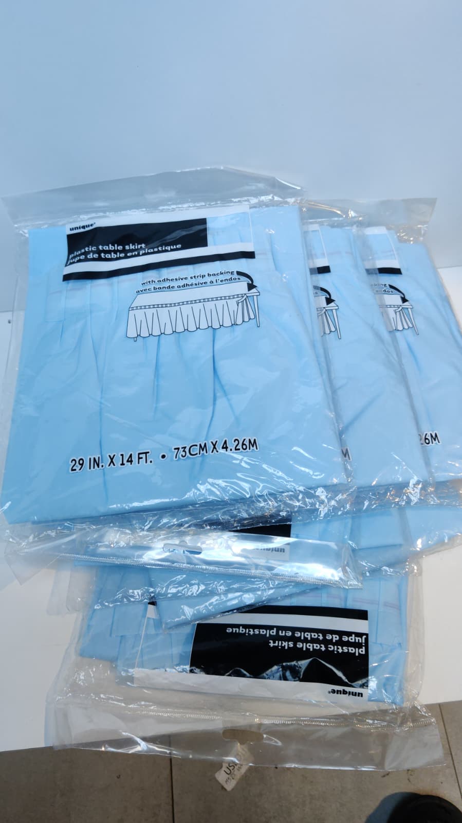 X9 OF PLASTIC TABLE SKIRT BABY BLUE 29IN X 14FT (73CM X 4.26M)