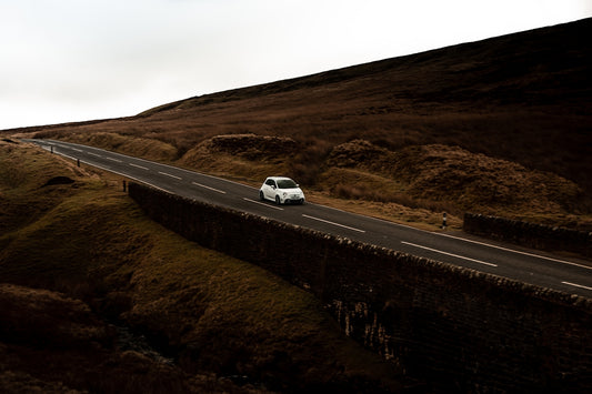 white car on road during daytime