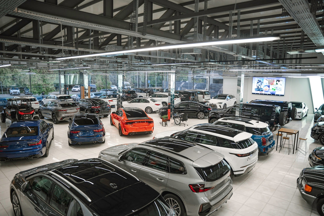 a bunch of cars are parked in a garage