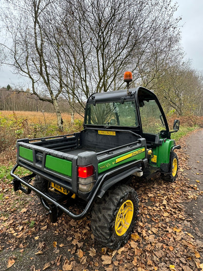 THIS 2014 JOHN DE2014 JOHN DEERE GATOR 855D