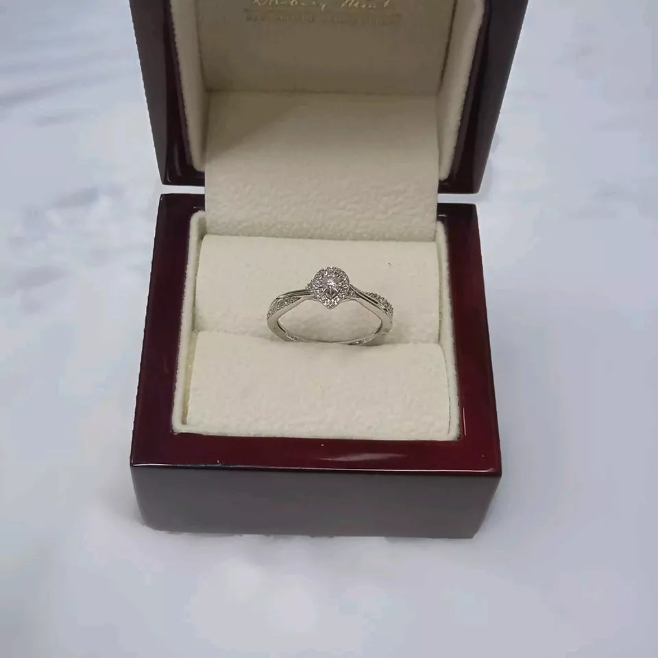 0.15CT DIAMOND ENGAGEMENT RING/9CT WHITE GOLD IN GIFT BOX WITH VALUATION CERTIFICATE OF £1395