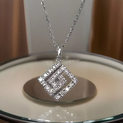 0.25CT DIAMOND PENDANT 9CT IN GIFT BOX WITH VALUATION CERTIFICATE OF £795