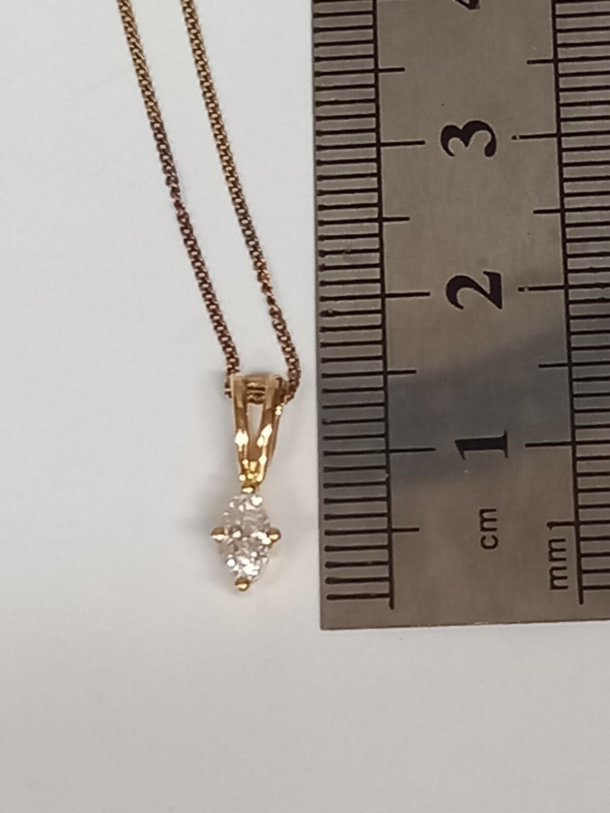 0.25CT MARQUISE DIAMOND PENDANT 9CT YELLOW GOLD WITH GIFT BOX AND VALUATION CERTIFICATE £1950