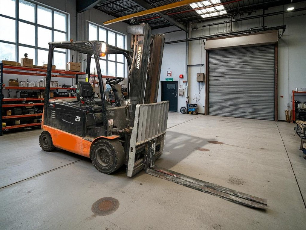 **(INCLUDES CHARGER)**DOOSAN B25X-5 – 4 WHEEL ELECTRIC FORKLIFT