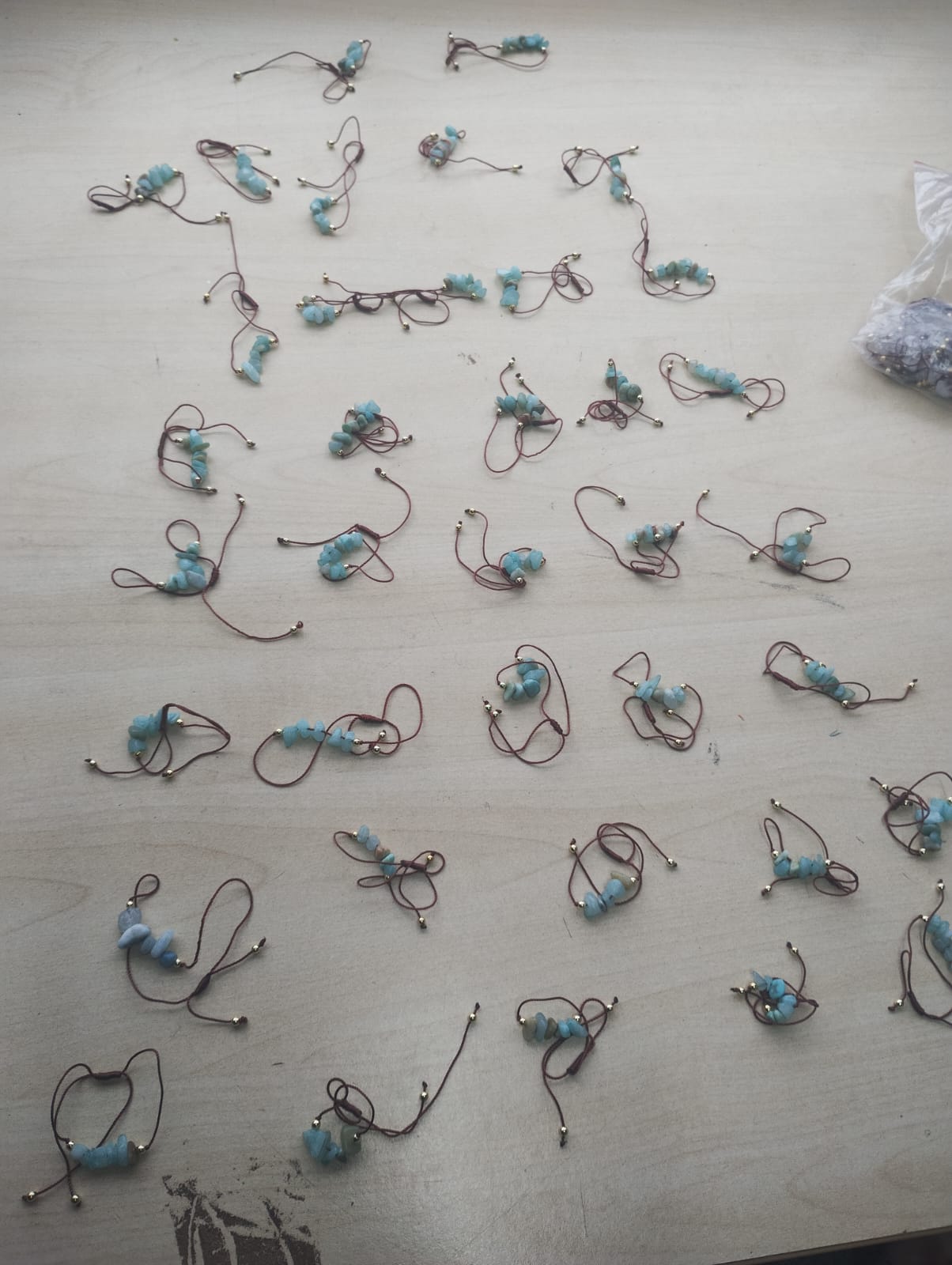 AQUAMARINE CRYSTAL CHIP BROWN COTTON ADJUSTABLE BRACELET JOB LOT OF 37- BRAND NEW