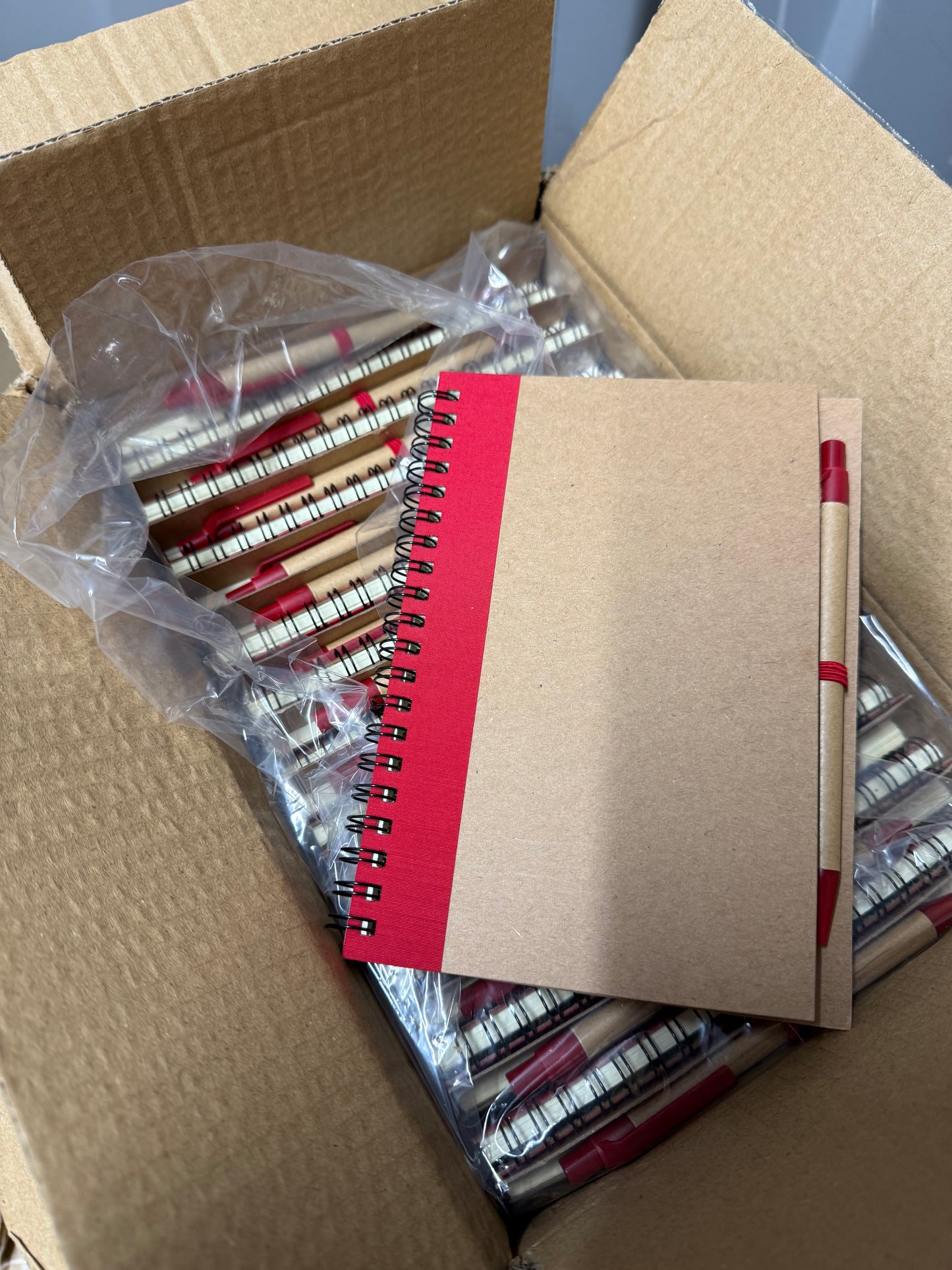 BOX OF 50 RED ECO SPIRAL NOTEBOOKS