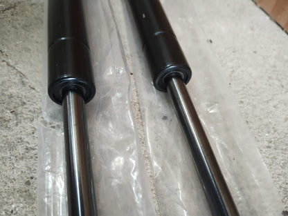 TAILGATE BOOT STRUT DAMPERS - PAIR - NEW - 685MM LONG