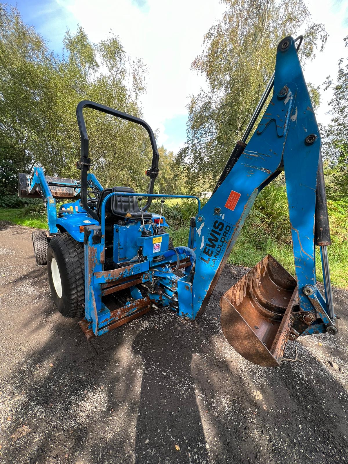 Bid on NEW HOLLAND TC27D BACK LOADER, SPOOL VALVE, ROLL PTO- Buy &amp; Sell on Auction with EAMA Group